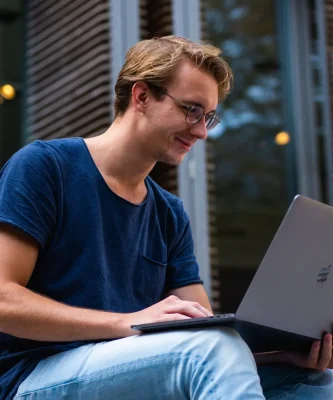 selective-focus-photo-of-man-using-laptop-1438081